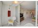 Bright enclosed lanai, seamlessly connecting to the living area, creating a cozy space with lots of sunlight at 244 Saint Augustine Ave # 905, Venice, FL 34285