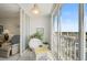 Enclosed lanai with tile flooring and large windows offering beautiful views and ample natural light at 244 Saint Augustine Ave # 905, Venice, FL 34285