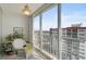 Relaxing enclosed lanai featuring neutral colors, tile floors, and a scenic view, perfect for enjoying city views at 244 Saint Augustine Ave # 905, Venice, FL 34285