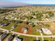 An aerial view showing the house highlighted in red and the surrounding neighborhood at 25259 Alcazar Dr, Punta Gorda, FL 33955