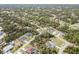 Expansive aerial shot capturing the community's lush landscape and neighborhood layout at 3189 Seattle Ave, North Port, FL 34286