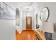 Elegant foyer with wood floors and an arched entryway at 3189 Seattle Ave, North Port, FL 34286