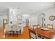 Bright open kitchen with a center island, stainless appliances, and a dining table at 3189 Seattle Ave, North Port, FL 34286