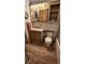 Bathroom features wood cabinets, laminate countertops and a shower/tub combo at 3333 26Th E Ave # 28, Bradenton, FL 34208