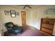 Cozy reading nook featuring an armchair, and a bookshelf in a peaceful setting at 3333 26Th E Ave # 28, Bradenton, FL 34208