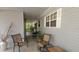 Covered patio with seating area and view of the deck, showcasing outdoor living space at 3333 26Th E Ave # 28, Bradenton, FL 34208