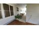 Inviting side porch with seating and ample space for relaxation at 3333 26Th E Ave # 28, Bradenton, FL 34208