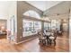 Dining room featuring modern flooring and a large bright window at 3815 Muirfield Ct, Palm Harbor, FL 34685