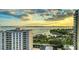 Scenic water view from condo featuring a skyline, boats, and clear skies at 401 S Palm Ave # 801, Sarasota, FL 34236