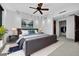 Contemporary bedroom with a king-sized bed, closet, and soft lighting, creating a relaxing atmosphere at 401 S Palm Ave # 801, Sarasota, FL 34236