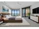Bedroom with water views, large windows and a queen-sized bed at 401 S Palm Ave # 801, Sarasota, FL 34236