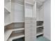 Walk-in closet with shelves and drawers for optimal storage at 401 S Palm Ave # 801, Sarasota, FL 34236