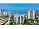Beautiful exterior shot of high-rise condos overlooking the beautiful blue ocean waters at 401 S Palm Ave # 801, Sarasota, FL 34236