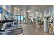 A well-equipped fitness center with treadmills, weight machines, and floor-to-ceiling windows at 401 S Palm Ave # 801, Sarasota, FL 34236