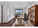 Home office with built-in shelves and a large window with a city view at 401 S Palm Ave # 801, Sarasota, FL 34236