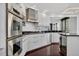 Modern kitchen with stainless steel appliances and dark countertops at 401 S Palm Ave # 801, Sarasota, FL 34236