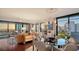 Inviting living space with stylish furnishings, floor to ceiling windows, and hardwood floors at 401 S Palm Ave # 801, Sarasota, FL 34236
