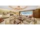 Bright lounge with fireplace, modern lighting, and comfortable seating arrangements at 401 S Palm Ave # 801, Sarasota, FL 34236