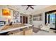 Bright office featuring a large desk, comfortable armchair, and balcony access at 401 S Palm Ave # 801, Sarasota, FL 34236