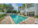 Outdoor pool and lounge area, perfect for relaxation and enjoying the Florida sunshine at 401 S Palm Ave # 801, Sarasota, FL 34236