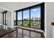 Panoramic city view from a large window with dark trim and hardwood floors at 401 S Palm Ave # 801, Sarasota, FL 34236