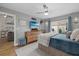 Cozy bedroom featuring a calming color palette, ceiling fan, and sliding glass door to the outdoor patio at 4023 Center Pointe Pl # 3A, Sarasota, FL 34233
