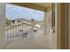 Balcony view overlooking the complex's buildings, carports and parking areas at 403 Auburn Lakes Cir # 403, Venice, FL 34292