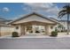 Inviting covered parking leading to well-maintained building entrance with stairs to upper units at 403 Auburn Lakes Cir # 403, Venice, FL 34292