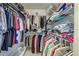 Walk-in closet featuring wire shelving, ample storage space for clothing and accessories at 403 Auburn Lakes Cir # 403, Venice, FL 34292