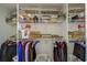 Closet featuring wire shelving with ample storage and clothing on hangers and stacked above at 403 Auburn Lakes Cir # 403, Venice, FL 34292