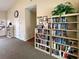 Well stocked community library with an assortment of books, decor, and comfortable lighting at 403 Auburn Lakes Cir # 403, Venice, FL 34292