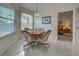 Inviting dining area featuring tile flooring and scenic views at 403 Auburn Lakes Cir # 403, Venice, FL 34292