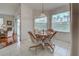 Bright dining area with tile flooring and natural light at 403 Auburn Lakes Cir # 403, Venice, FL 34292