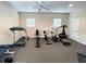 Community fitness center equipped with treadmills and other exercise machines for residents' use at 403 Auburn Lakes Cir # 403, Venice, FL 34292