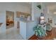 Cozy kitchen with breakfast bar and views of the living area at 403 Auburn Lakes Cir # 403, Venice, FL 34292