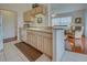 Bright kitchen with light wood cabinetry, great layout and view into the living area at 403 Auburn Lakes Cir # 403, Venice, FL 34292