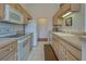 Functional kitchen with modern appliances and ample counter space at 403 Auburn Lakes Cir # 403, Venice, FL 34292