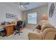 Bright home office area with comfortable seating and lots of light at 403 Auburn Lakes Cir # 403, Venice, FL 34292