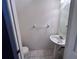 Well-lit half bathroom with pedestal sink, tile flooring, and functional layout at 4506 Runabout Way, Bradenton, FL 34203