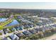 Residential neighborhood featuring single-Gathering homes, landscaping, and serene ponds in a desirable location at 4623 Claremont Park Dr, Lakewood Ranch, FL 34211