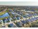 Residential neighborhood featuring single-Gathering homes, landscaping, and serene ponds in a desirable location at 4623 Claremont Park Dr, Lakewood Ranch, FL 34211