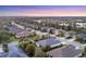 Residential neighborhood featuring single-Gathering homes, landscaping, and serene ponds in a desirable location at 4623 Claremont Park Dr, Lakewood Ranch, FL 34211