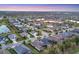 Residential neighborhood featuring single-Gathering homes, landscaping, and serene ponds in a desirable location at 4623 Claremont Park Dr, Lakewood Ranch, FL 34211