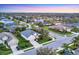 Residential neighborhood featuring single-Gathering homes, landscaping, and serene ponds in a desirable location at 4623 Claremont Park Dr, Lakewood Ranch, FL 34211