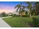 Beautiful single-story home with a well-manicured lawn and mature landscaping in a desirable neighborhood at 4623 Claremont Park Dr, Lakewood Ranch, FL 34211