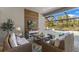 Inviting outdoor living area with stylish wicker furniture and pool view at 4735 Trento Pl, Bradenton, FL 34211