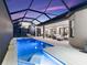 Gorgeous pool featuring seamless indoor-outdoor living with an open patio and spacious seating areas at 4735 Trento Pl, Bradenton, FL 34211