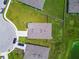 Aerial view of a well maintained home with lush green lawn and backyard, highlighting the community's landscaping at 4918 Gray Owl Ter, Palmetto, FL 34221