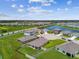 Beautiful aerial view of the homes and pond at 4918 Gray Owl Ter, Palmetto, FL 34221