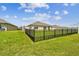 View of backyard featuring a fenced yard at 4918 Gray Owl Ter, Palmetto, FL 34221